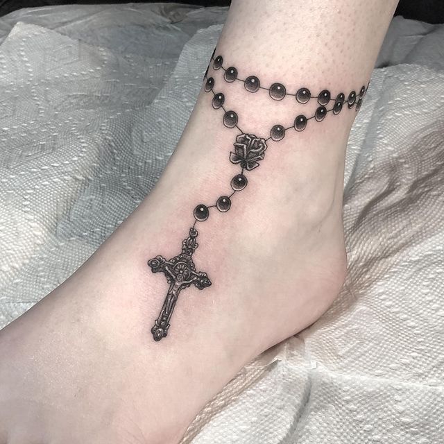Rosary foot tattoo