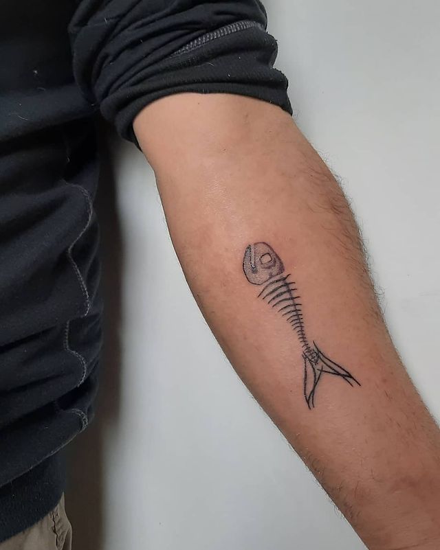 fishbone arm tattoo
