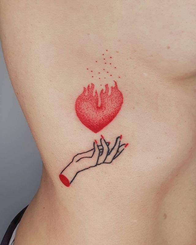 burning heart rib Tattoo