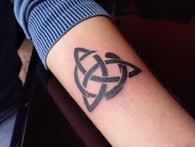 triquetra arm tattoo