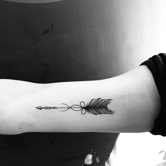black Feather Arrow arm Tattoo 