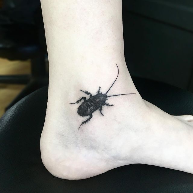 Cockroach ankle tattoo
