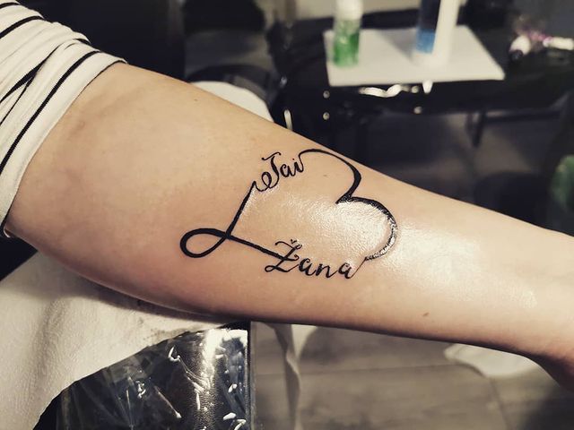infinity heart arm tattoo 