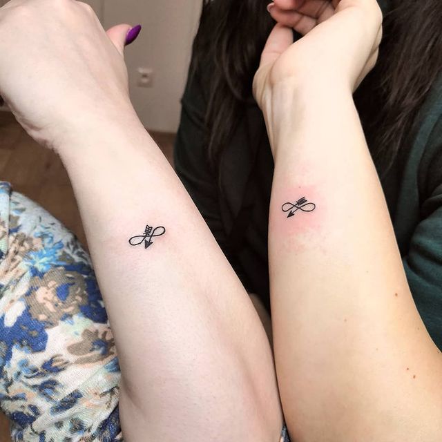 matching Infinity Arrow Tattoos 