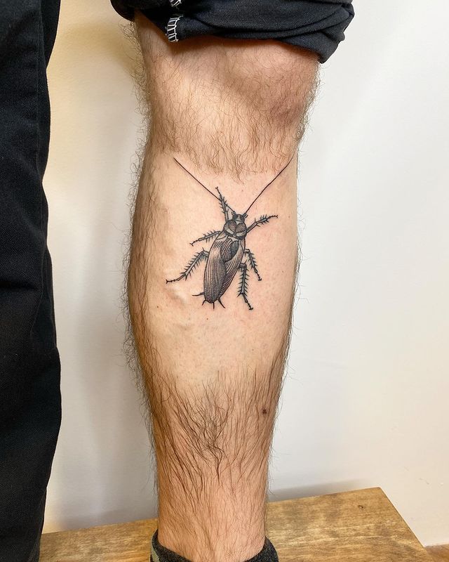 Cockroach calf tattoo 