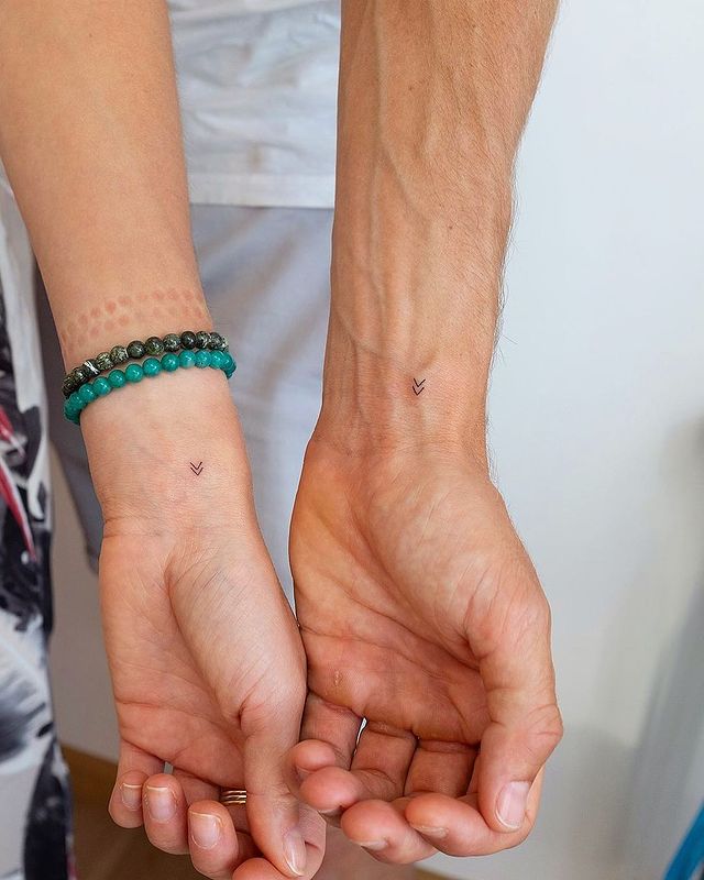 Double arrow couple tattoo