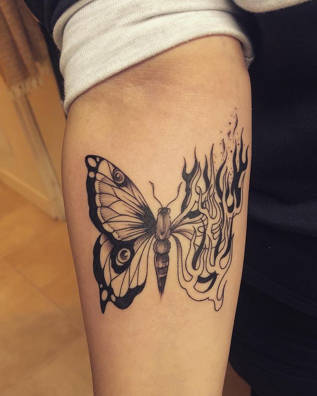 Burning Butterfly arm Tattoo