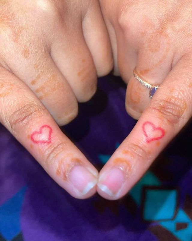 finger heart tattoo