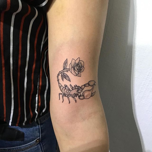 scorpion with a rose tattoo