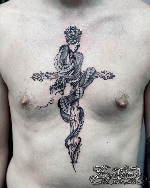 cross snake tattoo