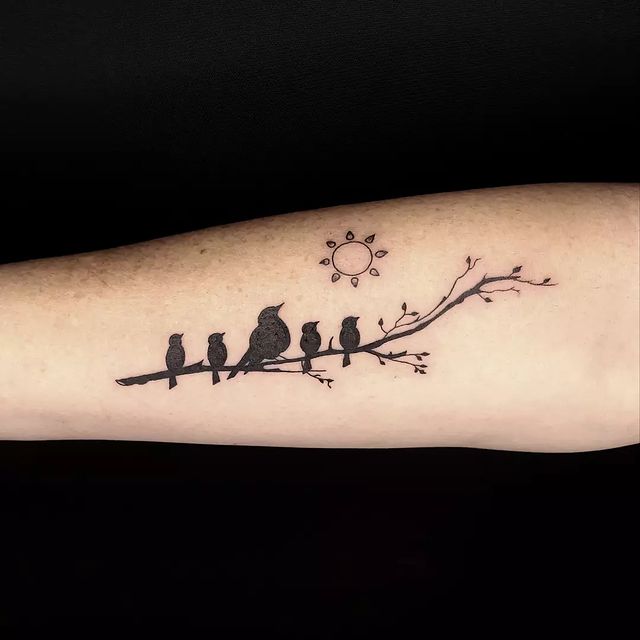 birds on branch tattoo
