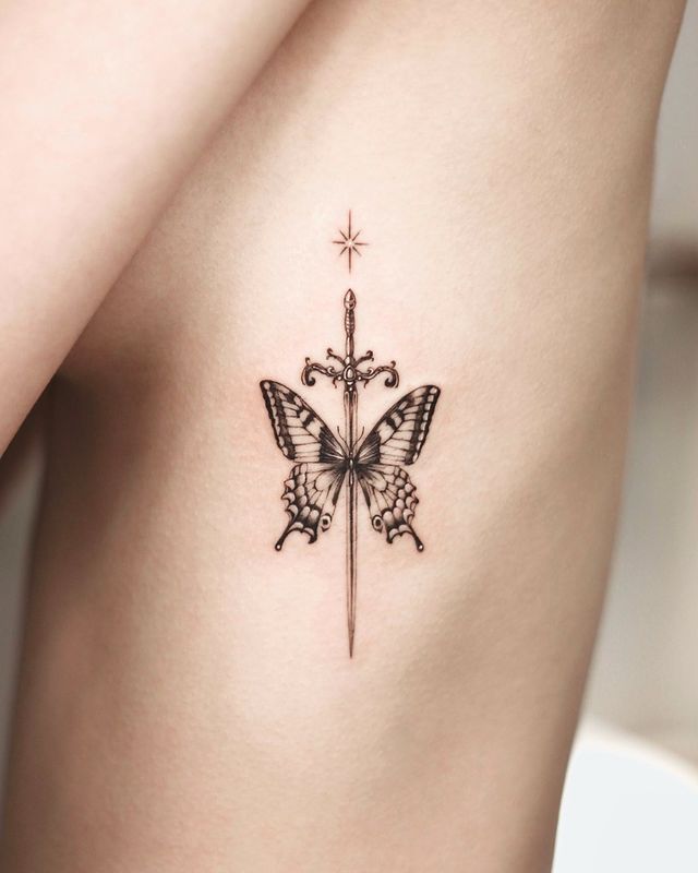 Butterfly and dagger side Tattoo