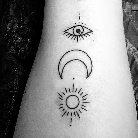 sun moon eye tattoo