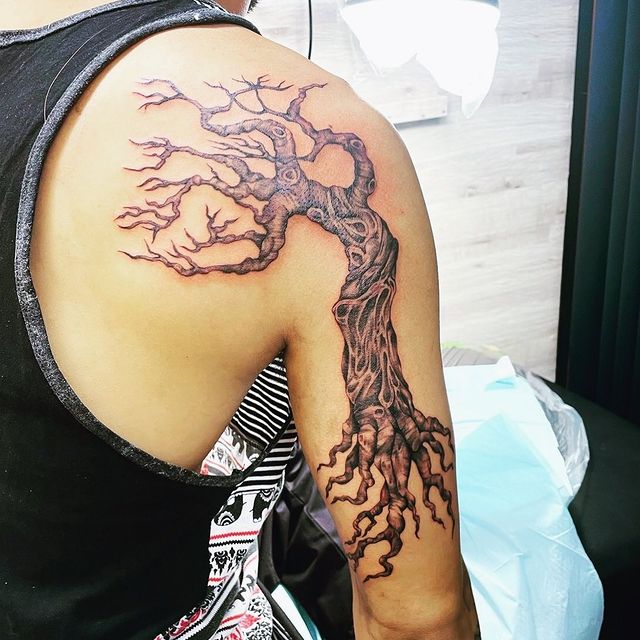 Dead tree tattoo