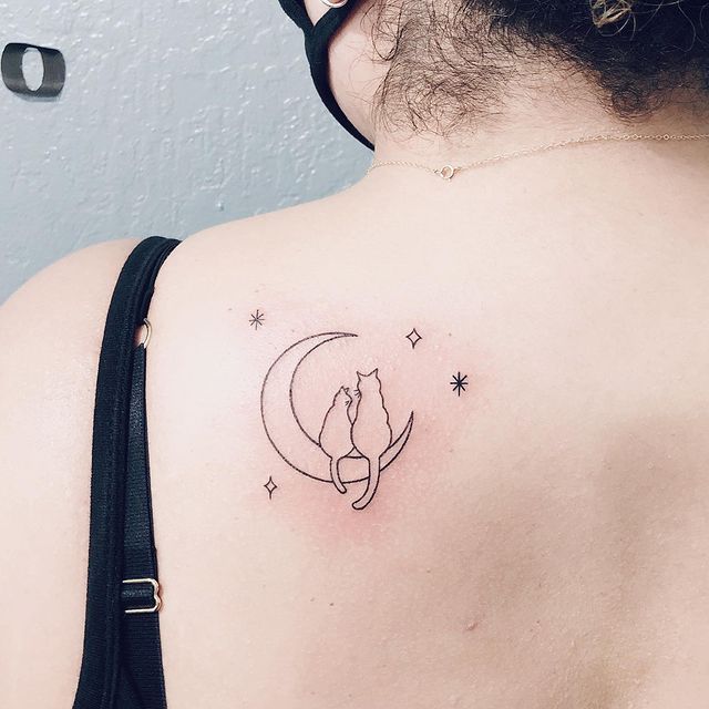 cat and moon back tattoo