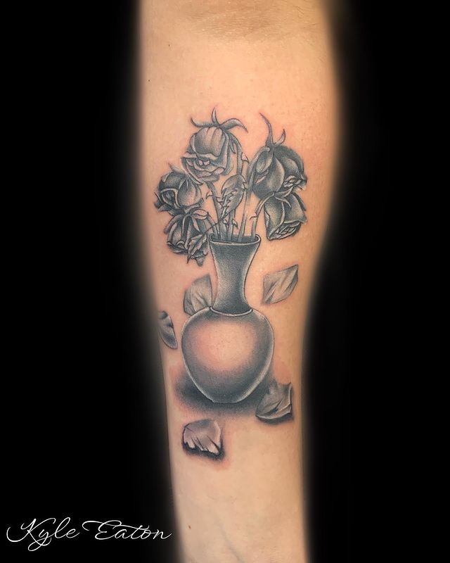 Vase of dead roses tattoo