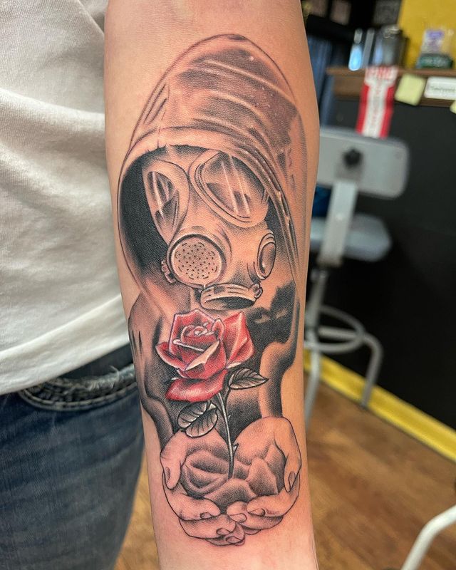 Flower with Gas mask tattoo