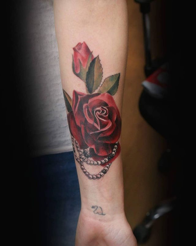 The rose with pearl tattoo