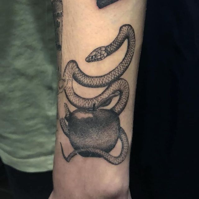 snake apple tattoo