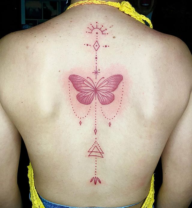 red butterfly back tattoo