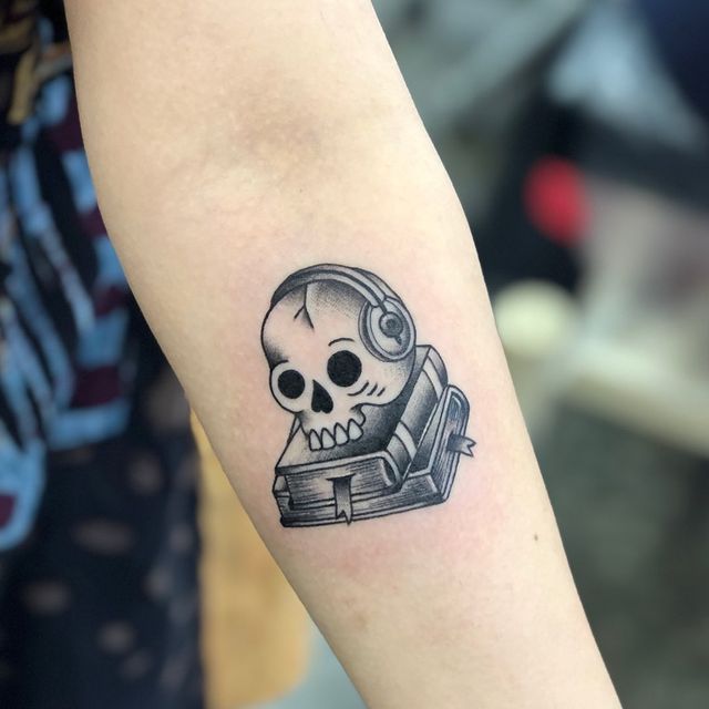 Skull on Book Tattoo Meaning ( learn until you're dead ? ) 