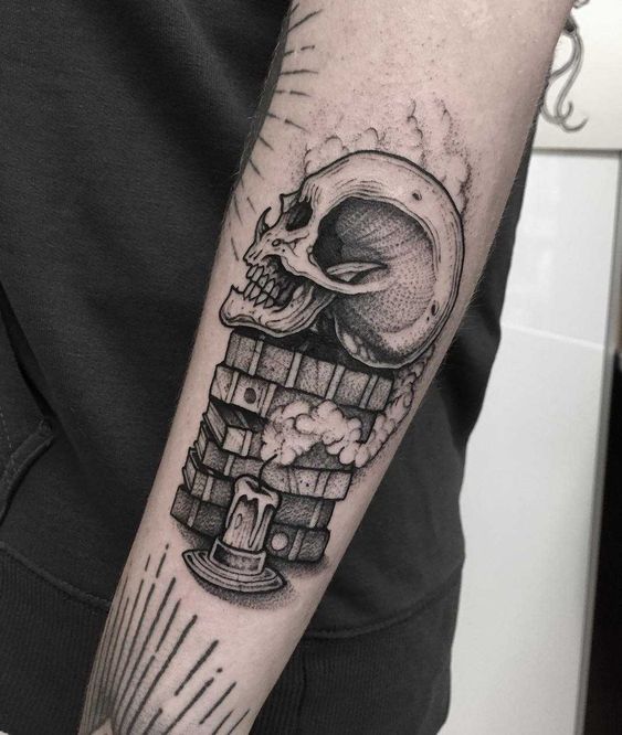 skull on book tattoo